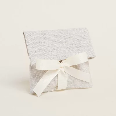 ΠΟΥΓΚΙ ΦΑΚΕΛΟΣ ΣΕ ΓΚΡΙ ΥΦΑΣΜΑ ΜΕ ΑΣΗΜΙ LUREX